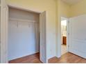 Walk-in closet with rod for storage, and access to the en-suite bathroom at 1950 Sterling Glen Ct, Sun City Center, FL 33573