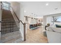 Open-concept living room and kitchen with modern finishes and ample natural light at 14786 Horse Trot Rd, Lithia, FL 33547