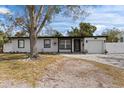 Charming single-story home with a well-maintained lawn and an attached garage at 4420 Pompano Se Dr, St Petersburg, FL 33705