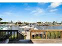 Waterfront property with private boat dock and lift, perfect for boating enthusiasts at 861 Symphony Isles Blvd, Apollo Beach, FL 33572