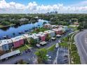 Breathtaking aerial view of colorful condos along the water, with the city skyline in the distance at 2424 W Tampa Bay Blvd # B201, Tampa, FL 33607