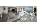 Staged living room with water views and a glass table set for dinner at 2910 W Barcelona St # Ph-2303, Tampa, FL 33629
