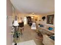 The inviting living room has comfortable seating, creating a warm and welcoming atmosphere at 4920 Locust Ne St # 203, St Petersburg, FL 33703