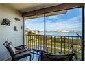 Screened balcony offering seating to enjoy spectacular views of the bay at 6218 Palma Del Mar S Blvd # 208, St Petersburg, FL 33715