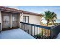 Condo exterior with scenic waterfront views from the balcony, offering a relaxing coastal experience at 6218 Palma Del Mar S Blvd # 208, St Petersburg, FL 33715