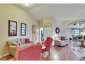 Comfortable living room with lots of space, featuring wood floors and neutral colors at 13108 Dobree Pl, Riverview, FL 33579