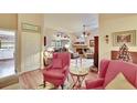 Inviting living room featuring vaulted ceilings, archways, and a cozy fireplace at 13108 Dobree Pl, Riverview, FL 33579