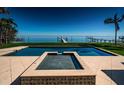 A backyard featuring a pool, spa, and views of the bay at 3901 Bayshore Ne Blvd, St Petersburg, FL 33703
