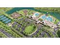 A stunning aerial view of the community's amenities, including pools, tennis courts, clubhouse, playground, and lush landscaping at 2416 Wise River Ln, Zephyrhills, FL 33541