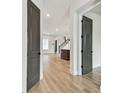 Inviting entryway showcasing modern design and beautiful flooring leading into the spacious living area at 441 42Nd Ne Ave, St Petersburg, FL 33703