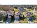 This aerial view showcases a desirable neighborhood setting, highlighting the home's position at 4506 Mapletree Loop, Wesley Chapel, FL 33544