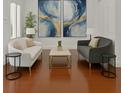 Bright living room showcasing elegant modern furniture, natural light, and stylish decor at 4023 W Horatio St, Tampa, FL 33609
