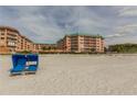 Beachside view of The Beach Cottage featuring beach access and lounge chairs at 18400 Gulf Blvd # 1505, Indian Shores, FL 33785