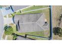 Birds-eye view of roof, landscaping and neighborhood at 714 Sugar Camp Way, Brooksville, FL 34604