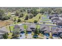 Aerial view of the property showcasing the home's location and backyard space at 714 Sugar Camp Way, Brooksville, FL 34604