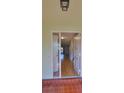 Inviting entryway features neutral decor and durable tile flooring leading inside at 2421 Lancaster Dr, Sun City Center, FL 33573