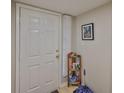 Clean, bright entryway with a tidy shelf and umbrella stand at 8609 Mallard Reserve Dr # 103, Tampa, FL 33614