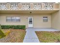 Inviting entryway with clean lines, updated features, and manicured landscaping offers an attractive welcome at 2351 Irish Ln # 21, Clearwater, FL 33763
