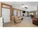 Bright living space boasts tile entryway and flows into dining and kitchen areas at 9111 Moonlit Meadows Loop, Riverview, FL 33578