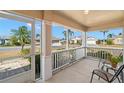 Inviting screened porch with seating and serene views of the neighborhood, ideal for relaxing outdoors at 1311 Caloosa Lake Ct, Sun City Center, FL 33573