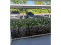 Carport area with cars parked, providing covered parking at 2060 Marilyn St # 133, Clearwater, FL 33765