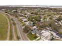 Scenic aerial view showcasing the neighborhood, waterfront, and distant city skyline at 710 S Davis Blvd, Tampa, FL 33606