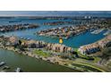 Aerial view of waterfront condo community with easy access to docks and water activities at 2775 Kipps Colony S Dr # 105, Gulfport, FL 33707