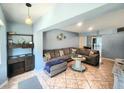 Cozy living room with tile floors, comfortable seating, and stylish decor at 12361 114Th St, Largo, FL 33778