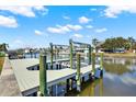 This property has a private boat lift and dock on a waterfront canal at 8421 Flagstone Dr, Tampa, FL 33615