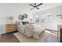Serene main bedroom with a plush bed, decorative accents, and bright, natural light at 881 6Th S Ave, St Petersburg, FL 33701