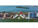 Aerial view of condo community on the water with a pin denoting property location at 7300 Sunshine Skyway S Ln # 202, St Petersburg, FL 33711