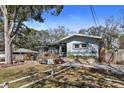Charming single story home with lovely yard, landscaping, and attractive features at 3087 Duane Ave, Oldsmar, FL 34677