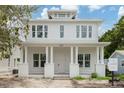 New two-story home with a large front porch and classic white columns at 5327 6Th N Ave, St Petersburg, FL 33710