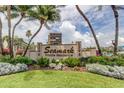 The Seamark Private Residence sign sits among tropical landscaping in front of the condominium building at 5396 Gulf Blvd # 110, St Pete Beach, FL 33706