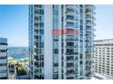 Modern high-rise condo with floor-to-ceiling windows and balcony overlooking water at 301 1St S St # 1605, St Petersburg, FL 33701