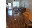 Inviting living room with wood flooring, comfortable seating, and plenty of natural light at 4915 Bay Ne St # 322, St Petersburg, FL 33703