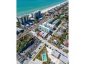 An aerial view of the property and surrounding area including the beach and nearby attractions at 50 154Th Ave # 50, Madeira Beach, FL 33708