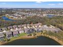 Enjoy scenic water views from this charming home in a peaceful neighborhood near a lake and recreational amenities at 13711 Moonstone Canyon Dr, Riverview, FL 33579