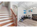 View of staircase, archway, and decorated living room at 4142 N Nebraska Ave, Tampa, FL 33603