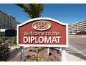 Welcome sign for The Diplomat building with the address 5980, inviting visitors with its clear display at 5980 Shore S Blvd # 510, Gulfport, FL 33707