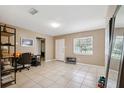 Versatile space with tile flooring, suitable for an office or living area at 2713 W Osborne Ave, Tampa, FL 33614