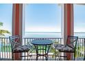 Enjoy stunning water views from this cozy balcony with seating for two at 4744 Snook Se Dr, St Petersburg, FL 33705