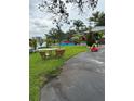 This beautifully landscaped backyard by the water offers a serene retreat at 2102 W Ivy St, Tampa, FL 33607
