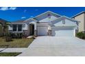 Beautiful single Gathering home with two-car garage and stone veneer accents at 3624 Autumn Amber Dr, Spring Hill, FL 34609