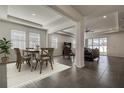 Open-concept living and dining area filled with natural light at 3624 Autumn Amber Dr, Spring Hill, FL 34609