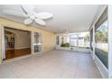 Spacious covered and screened in patio perfect for relaxing and entertaining, with sliding door access at 5913 Lawrin Ct, Wesley Chapel, FL 33544