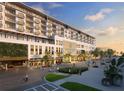 Elegant hotel exterior with lush landscaping, welcoming entrance, and convenient parking at 15000 Madeira Way # 527, Madeira Beach, FL 33708