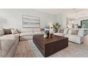 Spacious living room features a comfortable sectional sofa, stylish decor, and natural light at 532 W Plaza Pl # 2, Tampa, FL 33602
