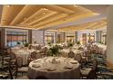 An elegant event space with round tables, floral centerpieces, and scenic ocean views through large windows at 15000 Madeira Way # 602, Madeira Beach, FL 33708