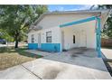 Charming home features a covered carport and unique brick accents on the exterior at 5511 N 32Nd St, Tampa, FL 33610